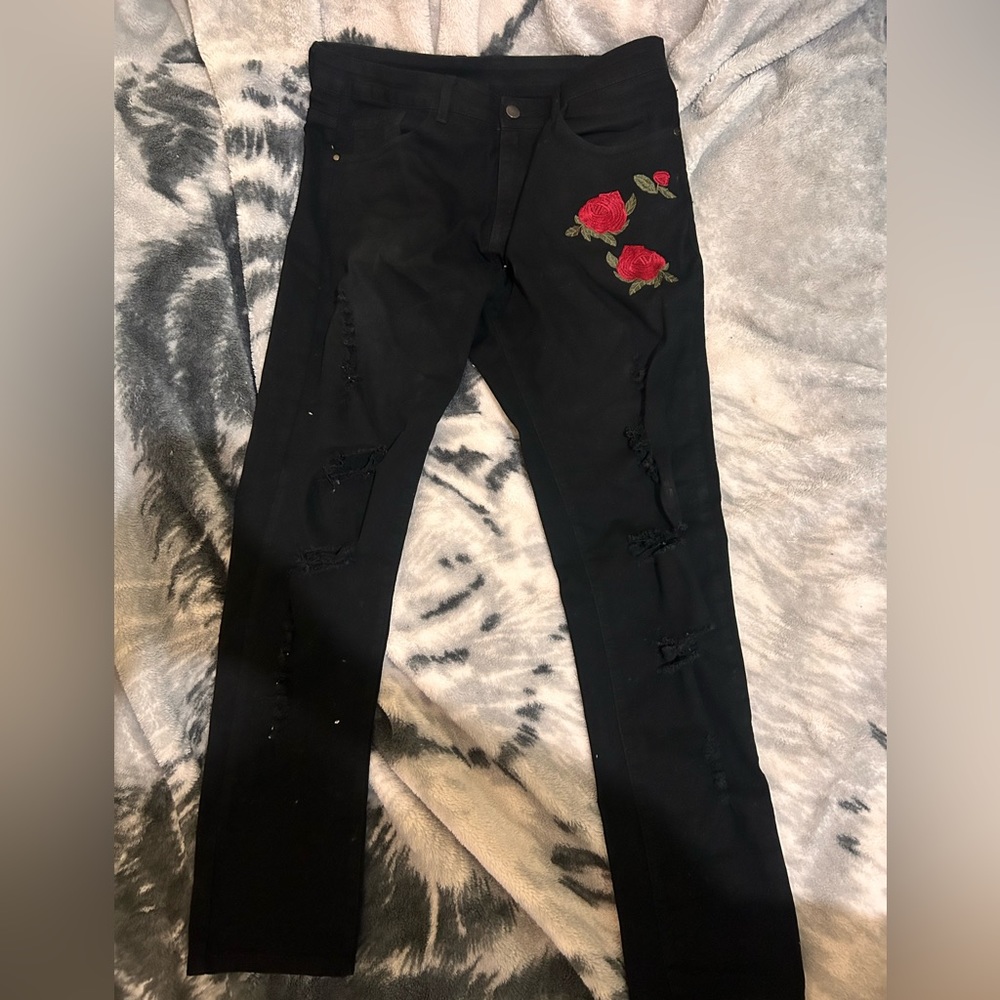 all black jeans with roses on pocket, size 32, inseam 32